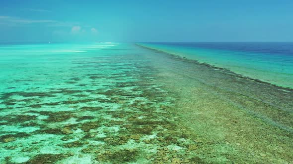 Aerial drone view abstract of paradise island beach holiday by blue water with white sandy backgroun