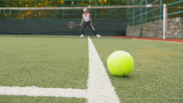 Tennis Ball on the Court