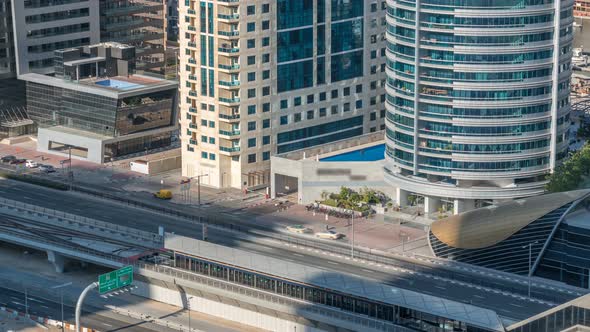 Aerial View of Dubai Tram in Dubai Marina Timelapse