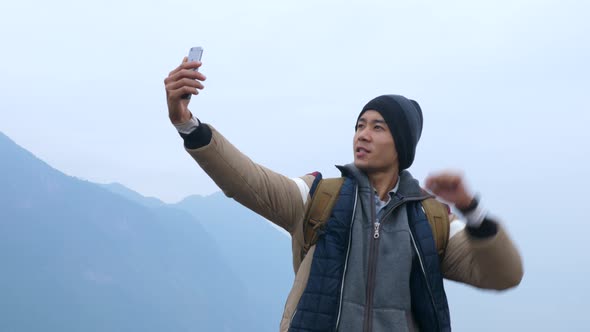 Hiker Selfie On Top Of Mountain