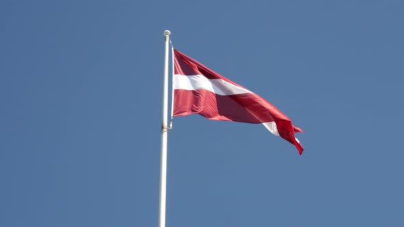 Latvian flag in the wind