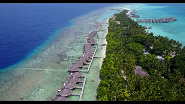 Aerial flying over tourism of marine island beach holiday by blue sea and bright sandy background of