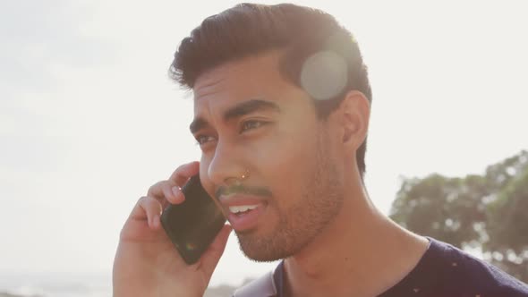 Young man talking on the phone