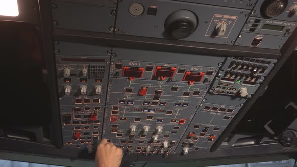 The Cockpit of the Aircraft. The Pilot Checks the Electronics of the Aircraft