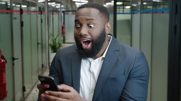 Happy African American Businessman Receiving Good News