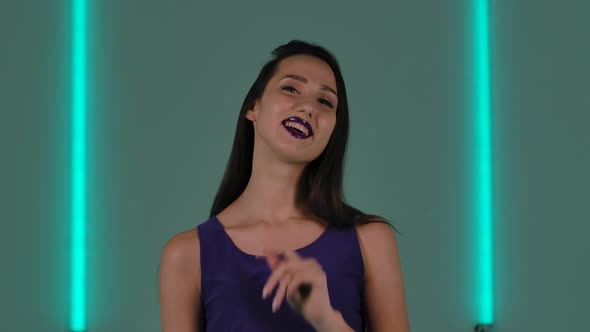 Portrait of Young Stylish Woman Posing for the Camera