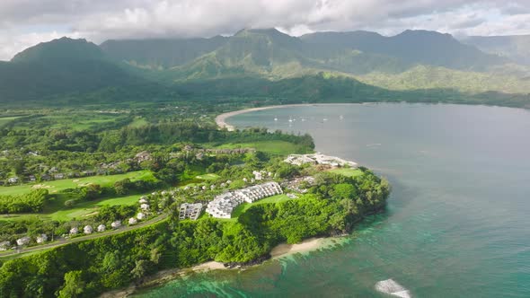 Cinematic Princeville Shore with Summer Beach Cottages Kauai Hawaii Landscape