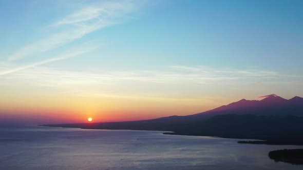 Aerial drone nature of perfect shore beach trip by blue green ocean and white sand background of a d