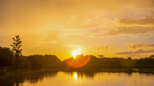 4k Time-lapse, View of Colorful dramatic sky sunset or sunrise with Moving clouds background alt