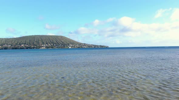 gliding above the ocean towards portlock beach neighborhood on oahu hawaii