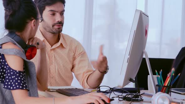 Creative Business People Group Having Conversation at Office Desk in Workplace