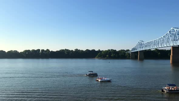 View of Ohio River and Glover Cary Bridge in Owensboro, Kentucky. Shot from Smothers Park. Left to r