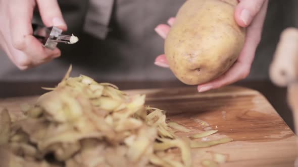 Step by step. Peeling Yukon gold potatoes for creamy mashed potatoes.