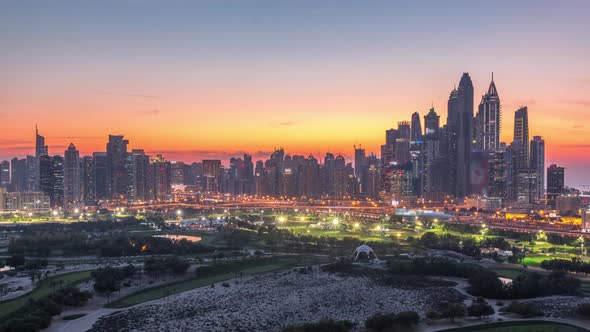 Dubai Marina Skyscrapers and Golf Course Day to Night Timelapse Dubai United Arab Emirates