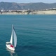 Circling Aerial Shot of Sailboat Cruising the Sea - VideoHive Item for Sale