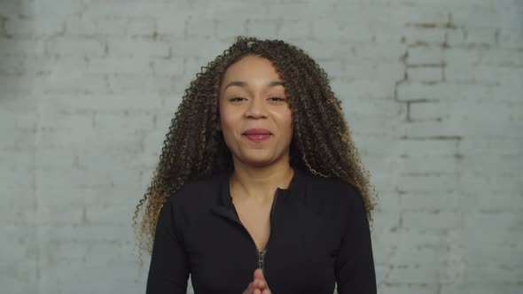 Positive Black Woman Talking on Webcam for Vlog