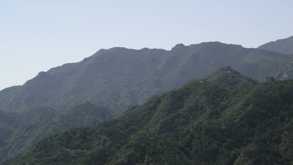 Panning shot of the mountains near the Great Wall of China at Badaling.