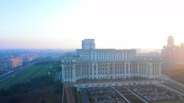 Sunset Drone Shot Of The Palace Of The Parliament in Bucharest, Romania 