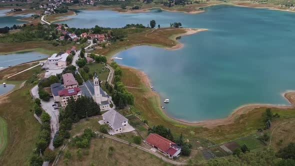 Franciscan Monastery Of Rama Beside Ramsko Lake, Prozor Rama, Bosnia And Herzegovina  alt