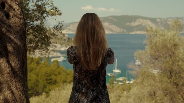 Female Take Photo On Beautiful Place In Turkey Coast. Woman Taking Selfie When Stay On Cliff.