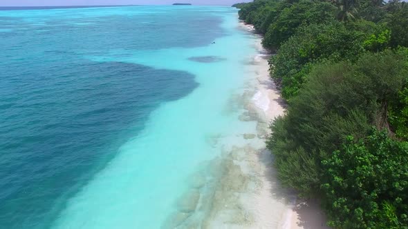 Drone view tourism of island beach time by ocean with sand background