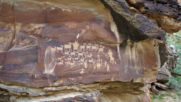 View of petroglyphs carved into the cliffs in Utah rotating