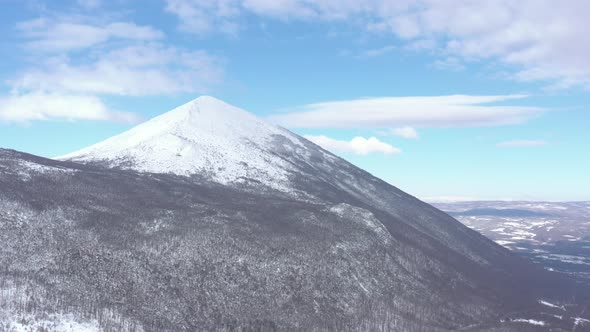 Mountain Rtanj peak under snow 4K drone footage