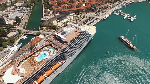 Cruise Ships Stand Off the Coast of the Town of Kotor