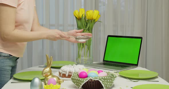 Woman Applies White Powder on Cake