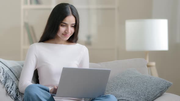 Confident Arabian Freelancer Islamic Young Woman Designer Student Sitting in Comfort Lotus Pose on