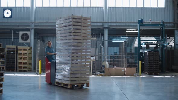 Woman Driving Storehouse Vehicle Sorting Supply Delivery Pallets Managing