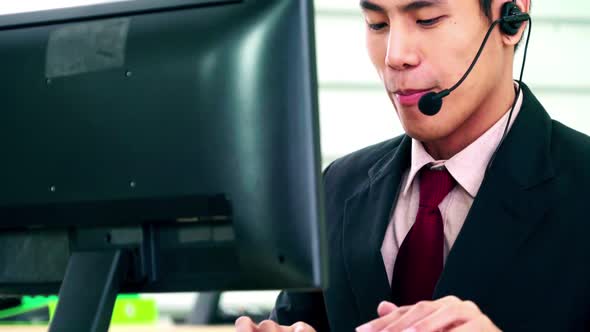 Business People Wearing Headset Working in Office