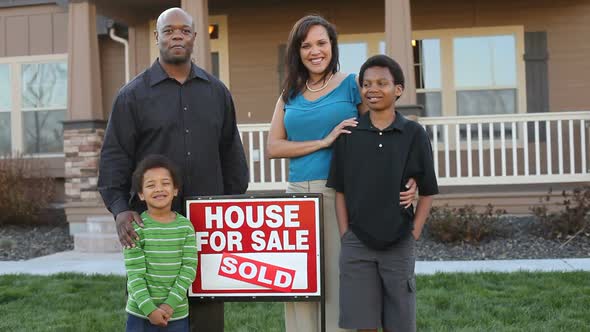 Happy African American family buy a house