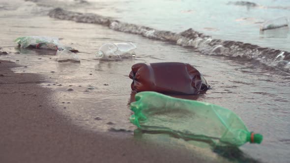 Plastic Garbage Lying on the Beach