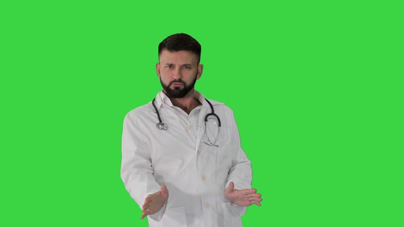 Young Doctor From Middle East Wearing Lab Coat Dancing on a Green Screen, Chroma Key