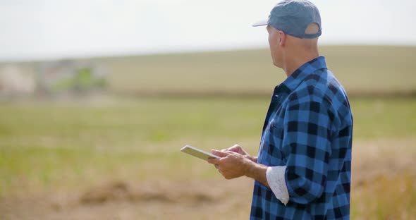 Farmer Using Digital Tablet Agriculture