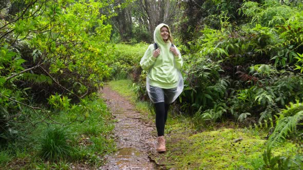 Slow Motion Woman Hiking Under Rain Tourist Moving Through Tropical Forest