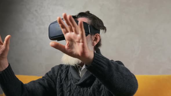 Elderly Man Experiences Virtual Reality