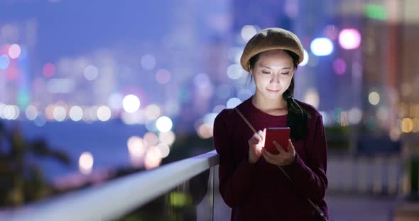 Woman use of cellphone in city