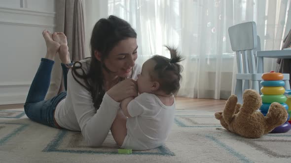 Mom Playing with Her Sweet girl