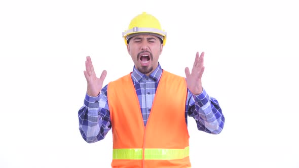 Stressed Bearded Persian Man Construction Worker Getting Bad News