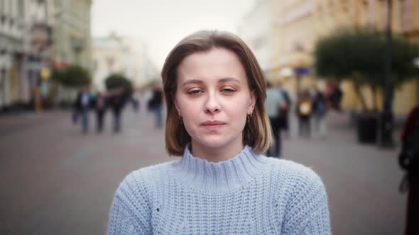 Face of Young Woman Look at Camera Smile Stand in the City Streets