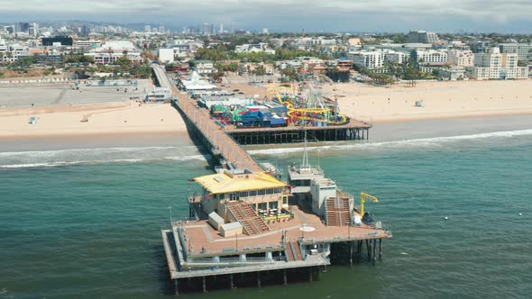 Cinematic Video of Santa Monica Pier on Sunny Day, Los Angeles, USA. Famous Pier