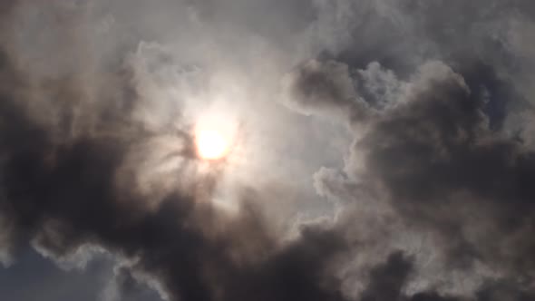 Sun Covered By Black Clouds of Smoke