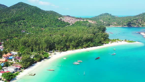 Wide overhead abstract view of a summer white paradise sand beach and blue water background