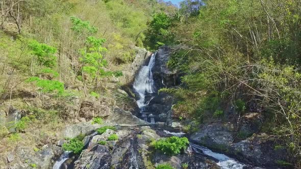 Flycam Removes From Nice Waterfall Start in Highland
