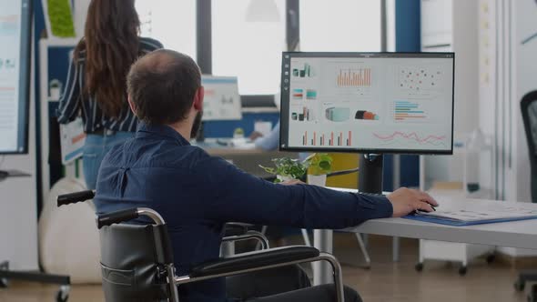 Group of Business People Discussing Company Plan Typing on Computer