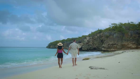 Couple Men and Woman Mid Age on the Beach of Curacao Grote Knip Beach Curacao Dutch Antilles