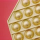 Golden Pop It on Red Background - VideoHive Item for Sale