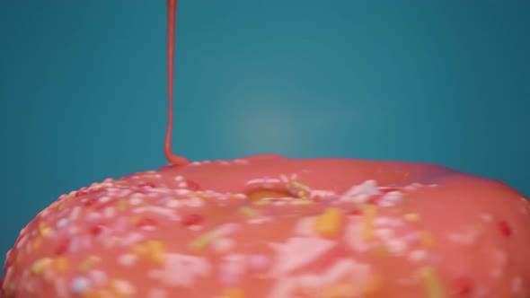 Glaze Pouring Onto the Spinning Donut